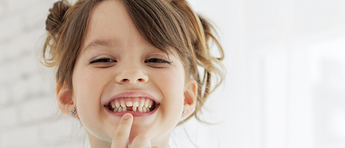 Loose baby teeth Hudsonville MI pediatric dentist